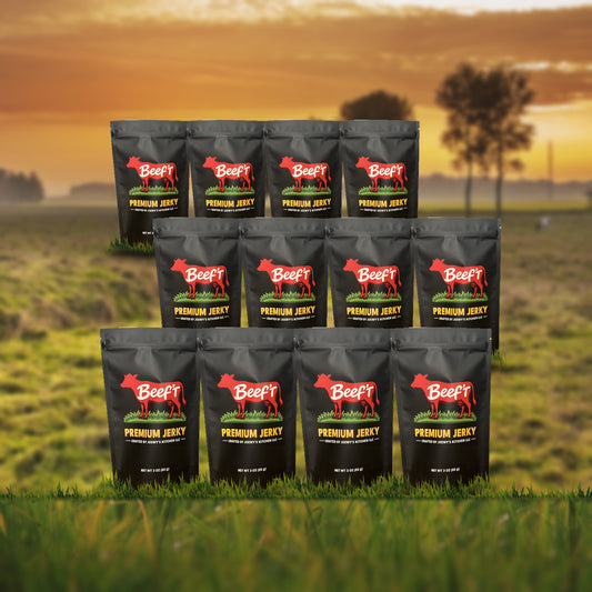 Beef't Premium Jerky Whole Herd 12-Pack, twelve bags standing in a farm pasture at sunset