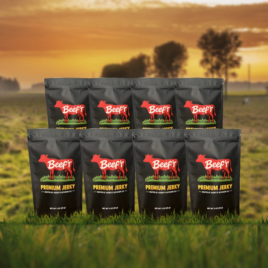 Beef't Premium Jerky Snack Stash 8-Pack, eight bags standing in a farm pasture at sunset